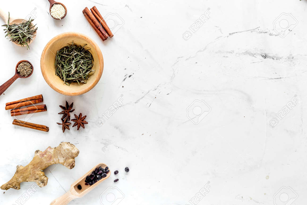 Spices, Cinnamon And Herbs On White Kitchen Table Background.. Stock Photo, Picture And Royalty Free Image. Image 81157339.