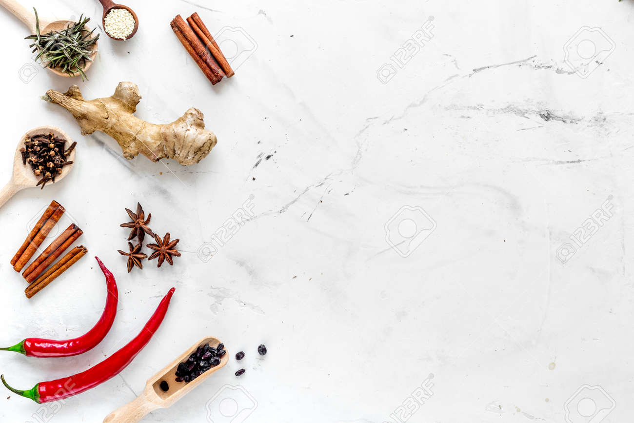 Spices, Chili And Cinnamon For Cooking On White Kitchen Table.. Stock Photo, Picture And Royalty Free Image. Image 78822011.