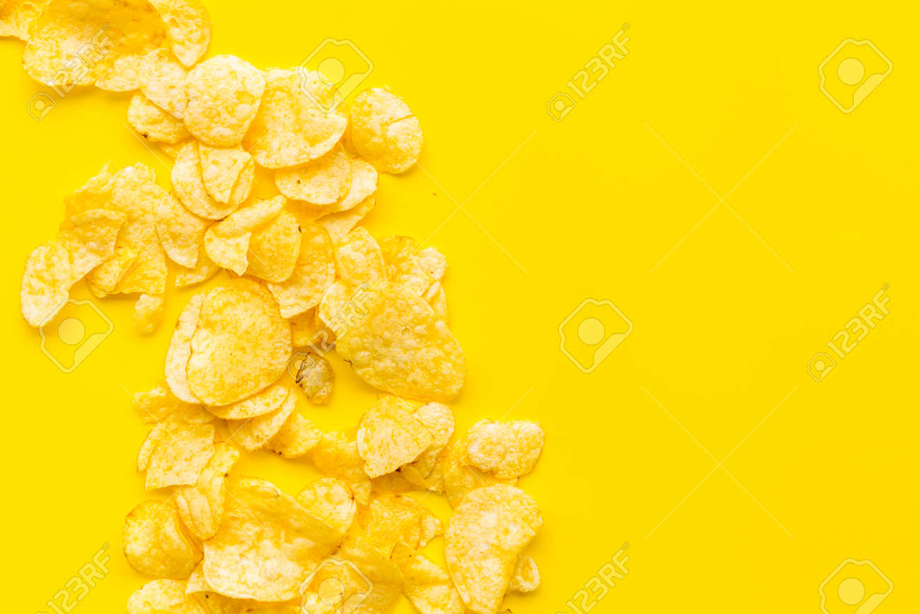 Download Potato Chips Pile On Yellow Background Top View Mockup Stock Photo Picture And Royalty Free Image Image 129244540 PSD Mockup Templates