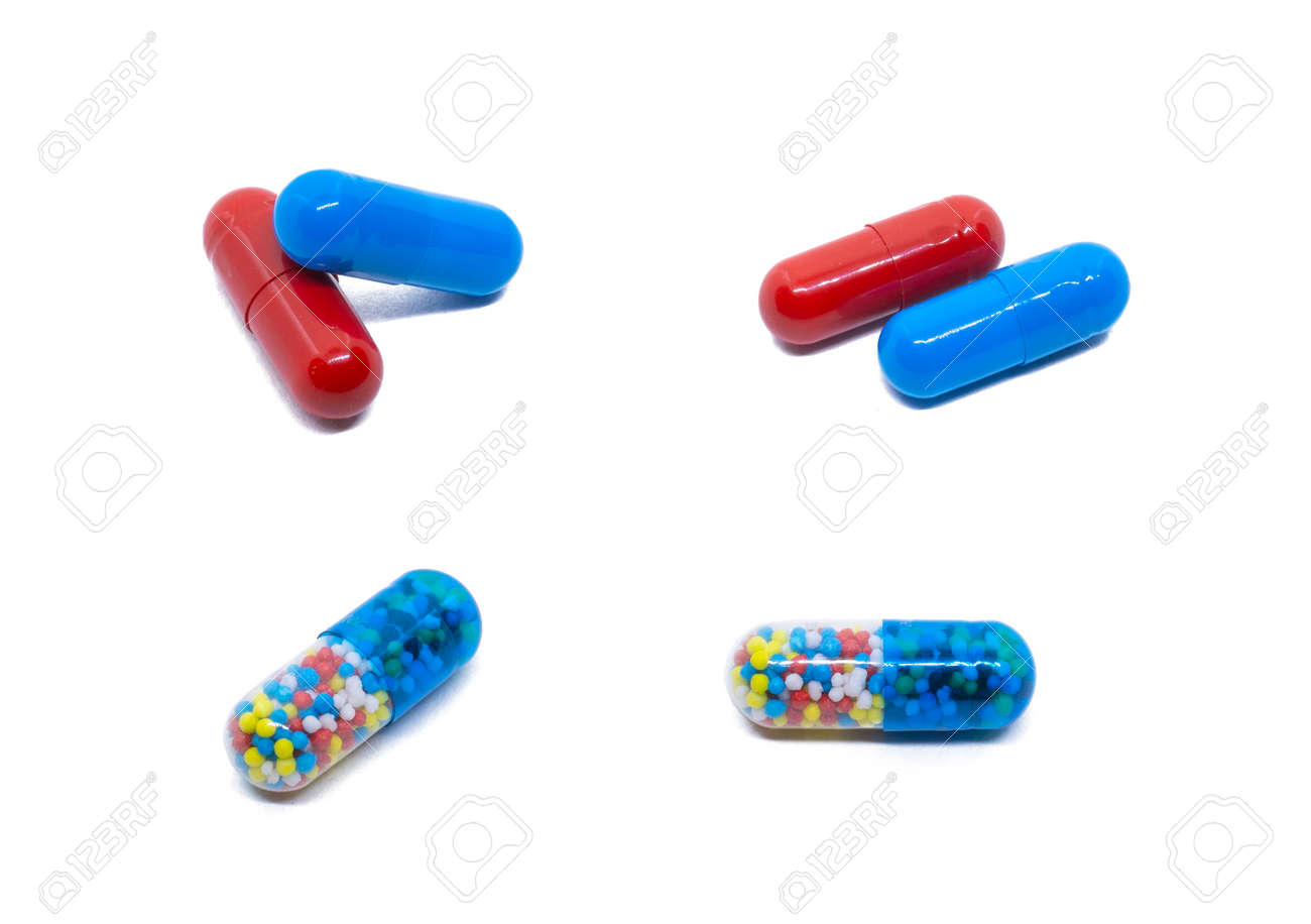Pills isolated on white. Red and blue pills. Transparent tablet with colored particles. - 132225256 Pills isolated on white. Red and blue pills. Transparent tablet with colored particles. - 132225256