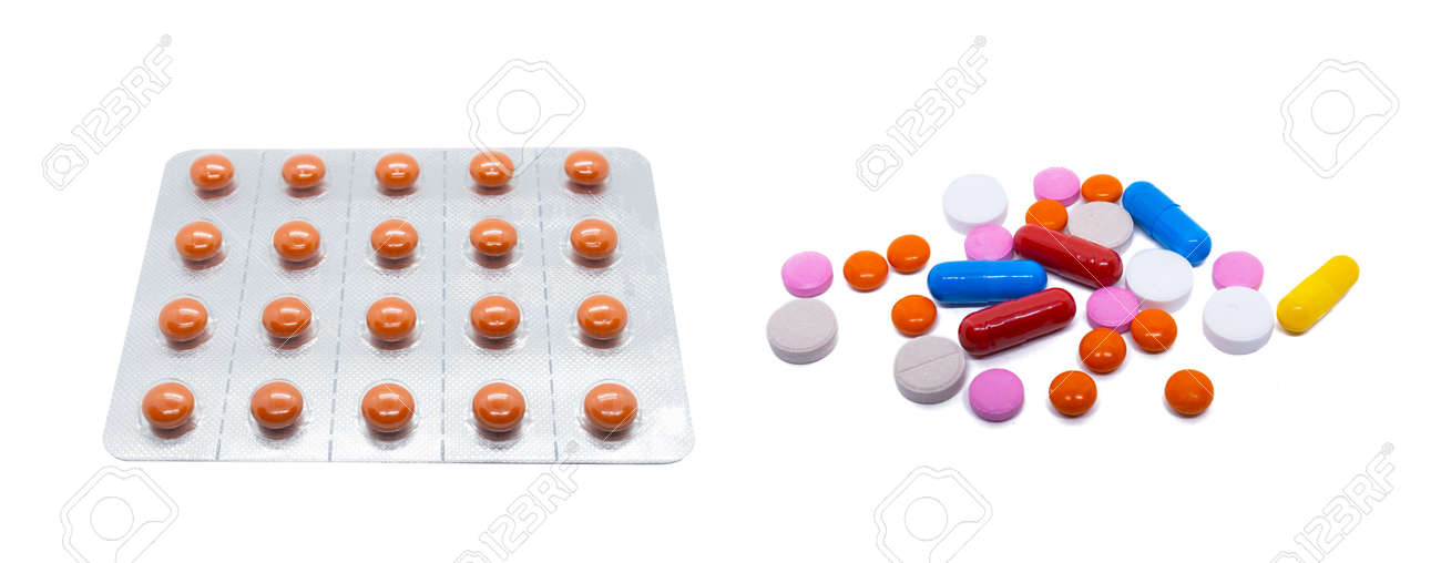 Orange pills in a plastic blister. A scattering of colored pills and medicines. Isolated pills on white - 132225337 Orange pills in a plastic blister. A scattering of colored pills and medicines. Isolated pills on white - 132225337