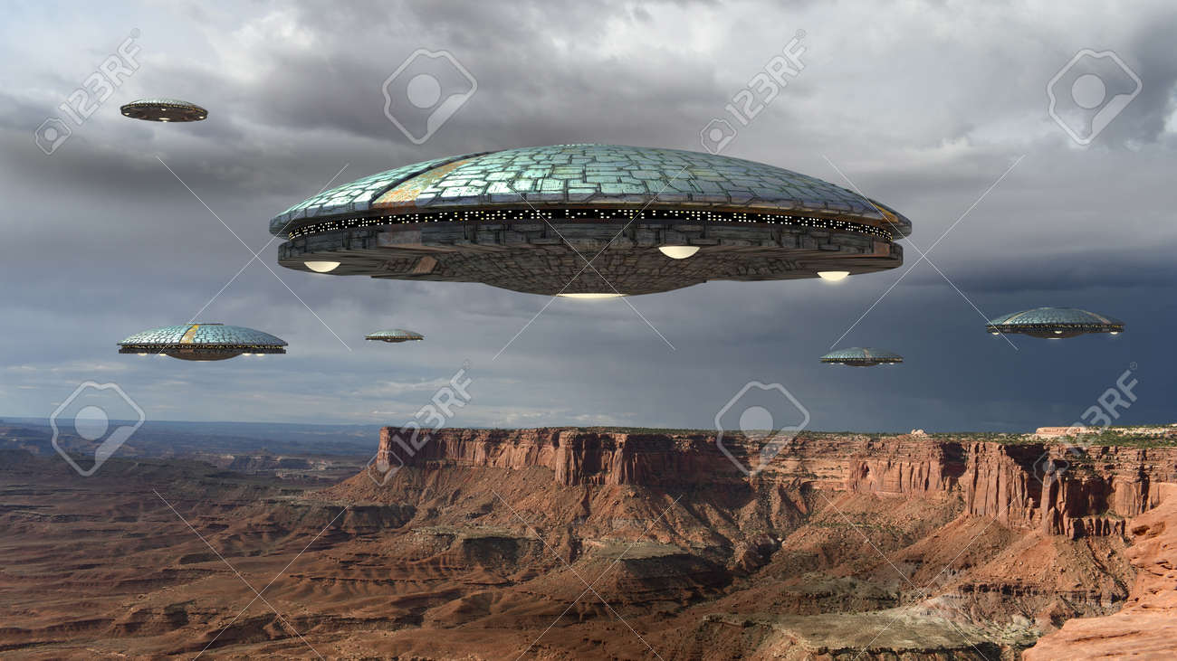 エイリアンの宇宙船の艦隊を米国ユタ州キャニオンランズ グランドキャニオンの上の未来的なファンタジーと星間旅行や戦争ゲームの背景 の写真素材 画像素材 Image エイリアンの宇宙船の艦隊を米国ユタ州キャニオンランズ グランドキャニオンの上の未来的なファンタジーと星間旅行や戦争ゲームの背景 の写真素材 画像素材 Image