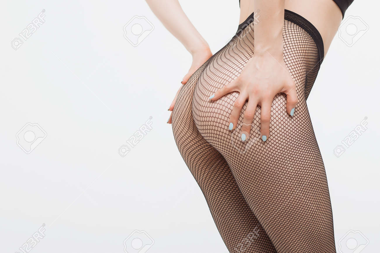 Crop Shot Of Seductive Naked Woman Bending Forward And Showing Curves In  Fishnet Tights Stock Photo, Picture and Royalty Free Image. Image 103724333.