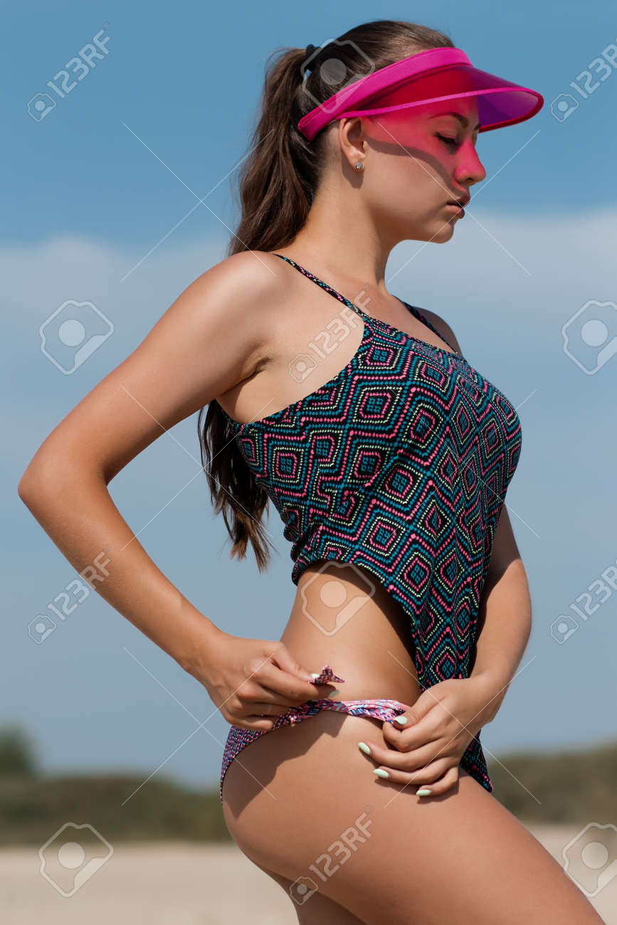 Sexy Woman Taking Off Panties On Beach Stock Photo, Picture and Royalty  Free Image. Image 153027191.