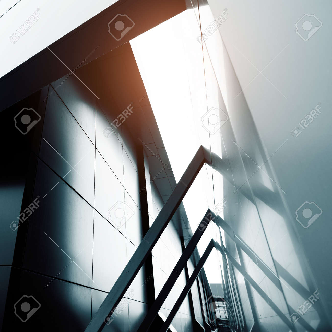 Wide angle abstract background view of steel light blue high rise commercial building skyscraper made of glass exterior. concept of successful industrial architecture and office center building - 56812556 Wide angle abstract background view of steel light blue high rise commercial building skyscraper made of glass exterior. concept of successful industrial architecture and office center building - 56812556