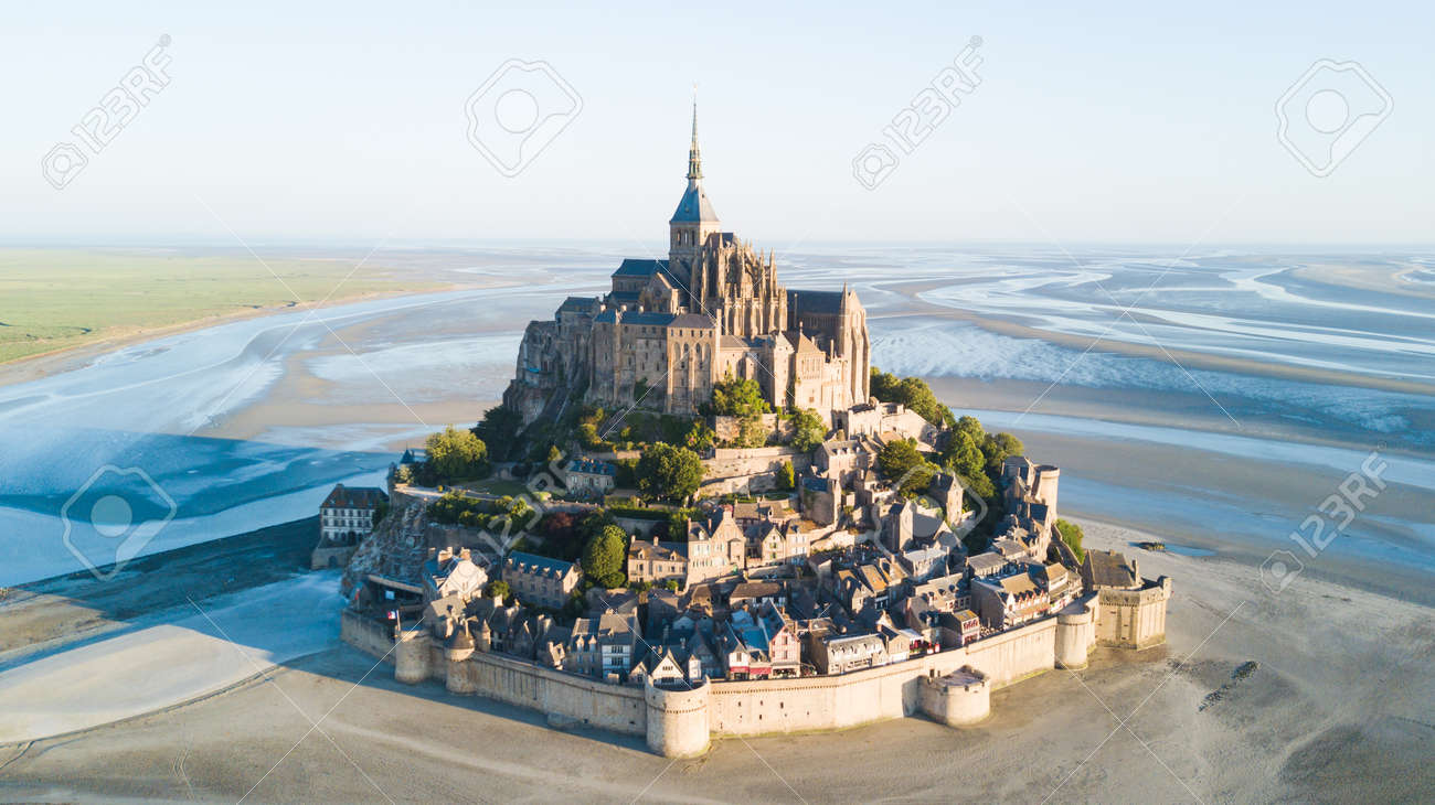 Le Mont Saint-Michel tidal island in beautiful twilight at dusk, Normandy, France - 82399093 Le Mont Saint-Michel tidal island in beautiful twilight at dusk, Normandy, France - 82399093