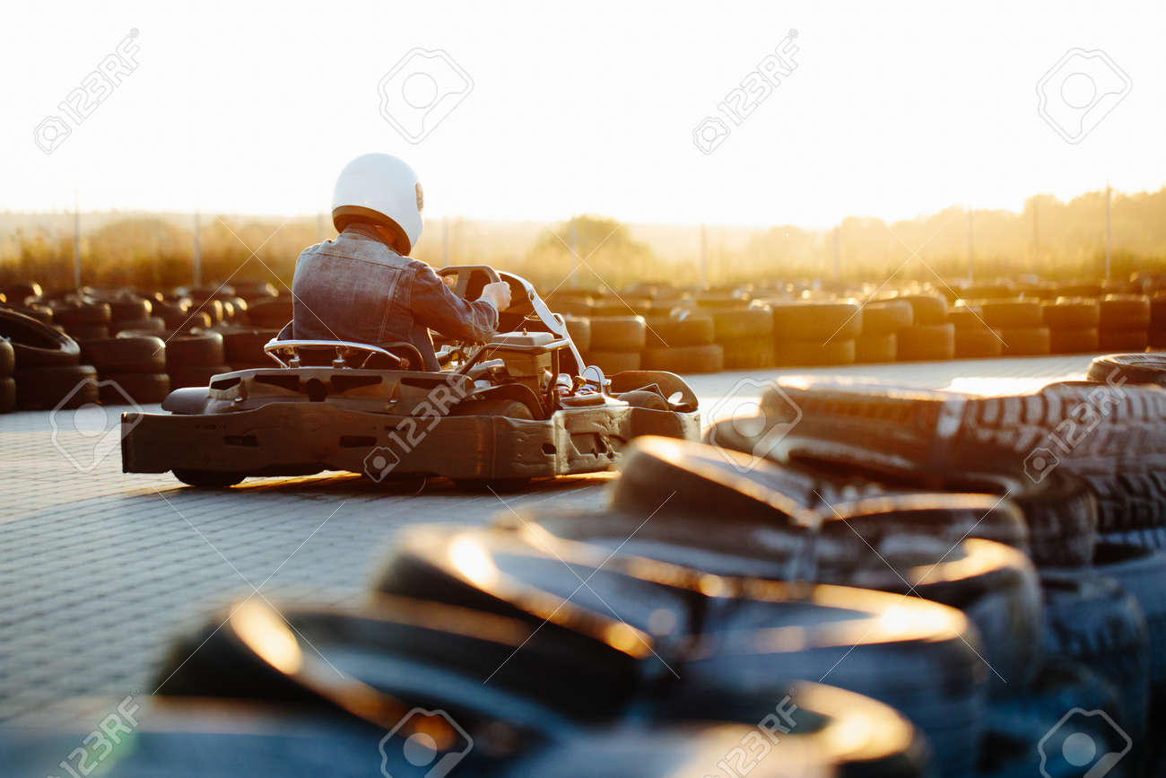 Karting competition or racing cars riding for victory on a racetrack - 85282784 Karting competition or racing cars riding for victory on a racetrack - 85282784