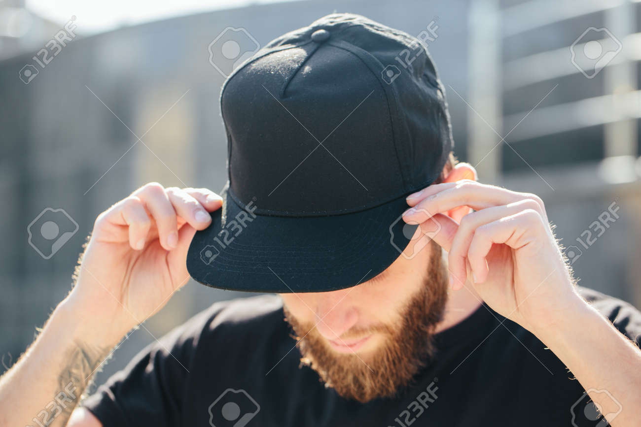 Hipster handsome male model with beard wearing black blank baseball cap with space for your logo - 87436205 Hipster handsome male model with beard wearing black blank baseball cap with space for your logo - 87436205