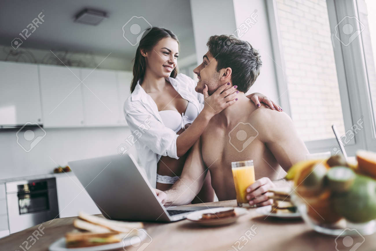 Good Morning Young Romantic Couple Is Having Breakfast On Modern