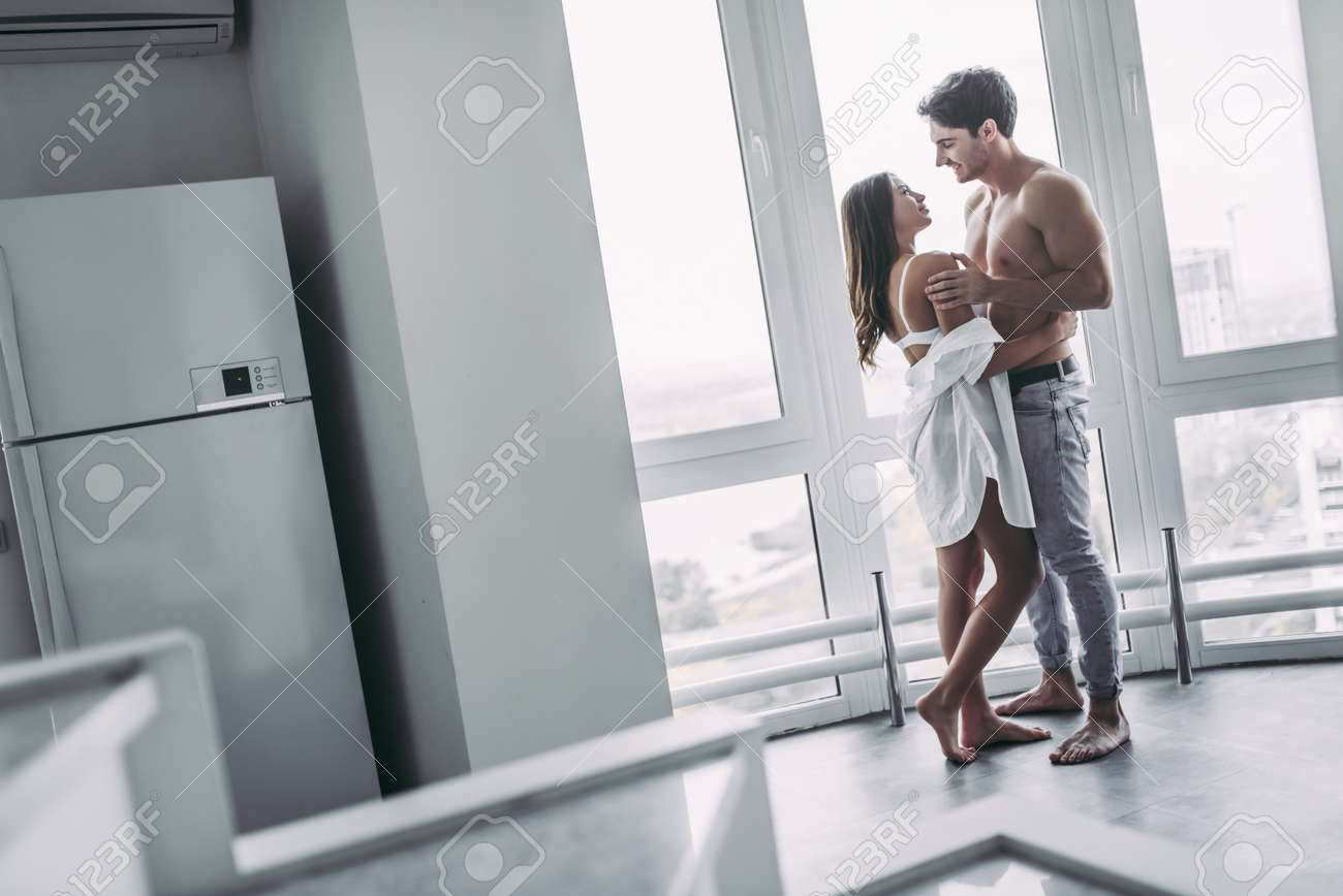 Good Morning Young Romantic Couple On Light Modern Kitchen With