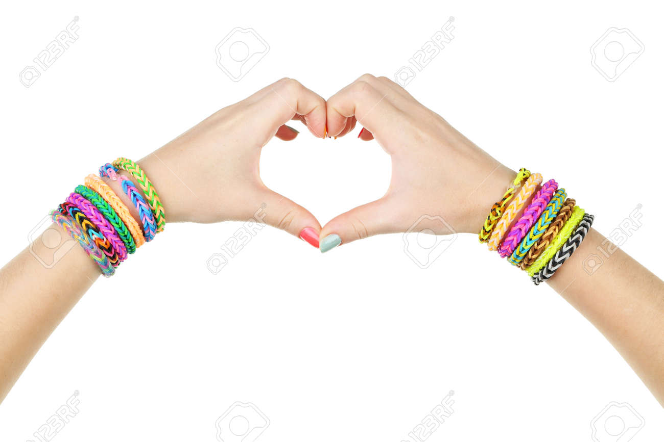 Manos Femeninas En Forma De Corazón Con Pulseras De Goma De Colores Fotos Retratos Imágenes Y Fotografía De Archivo Libres De Derecho Image 42194734