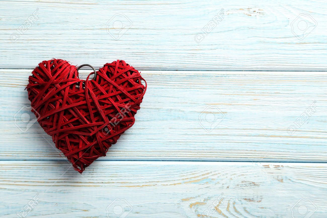 Love heart on a blue wooden background - 50736343 Love heart on a blue wooden background - 50736343