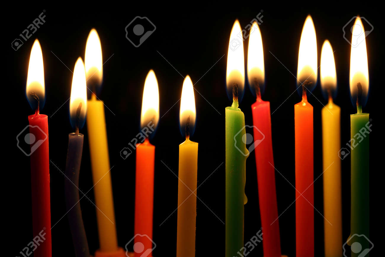 some lit birthday candles close up stock photo picture and royalty