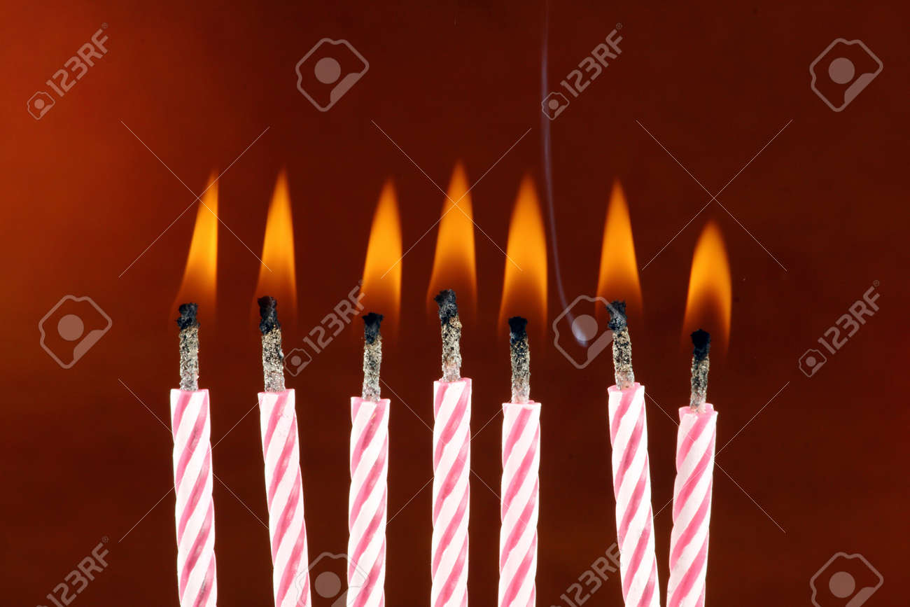 some lit birthday candles close up stock photo picture and royalty
