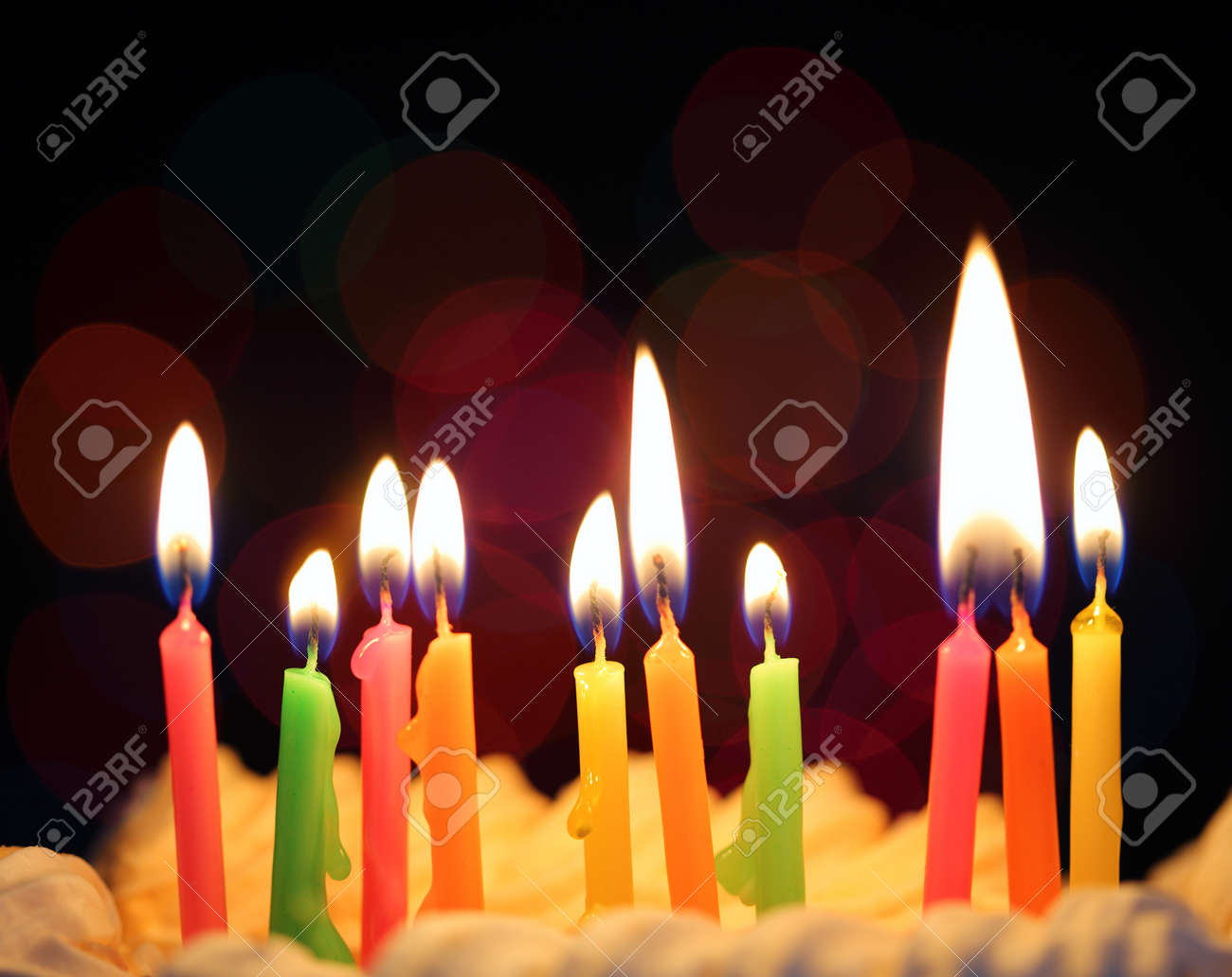 some lit birthday candles close up stock photo picture and royalty