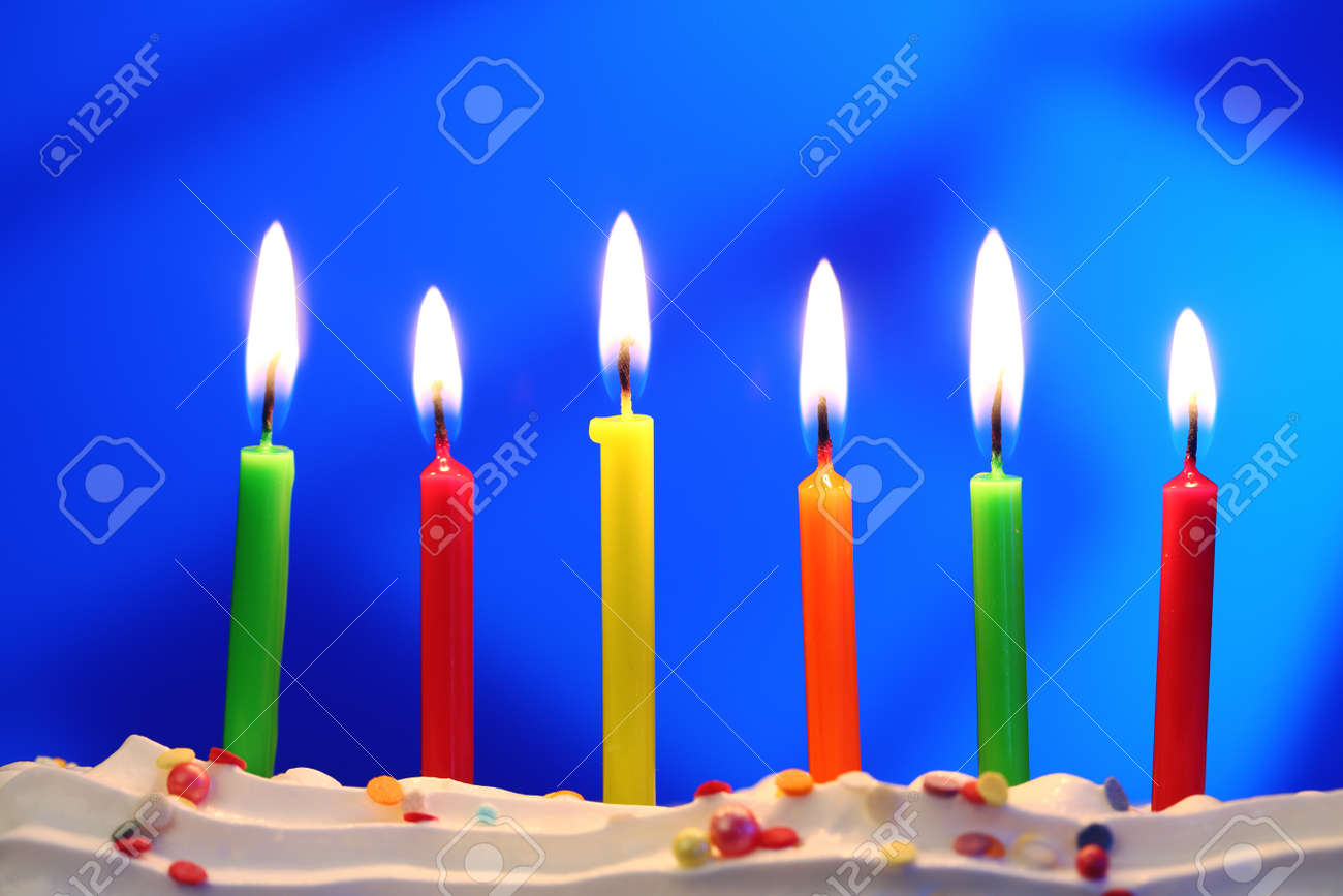 six lit birthday candles close up shallow dof stock photo picture