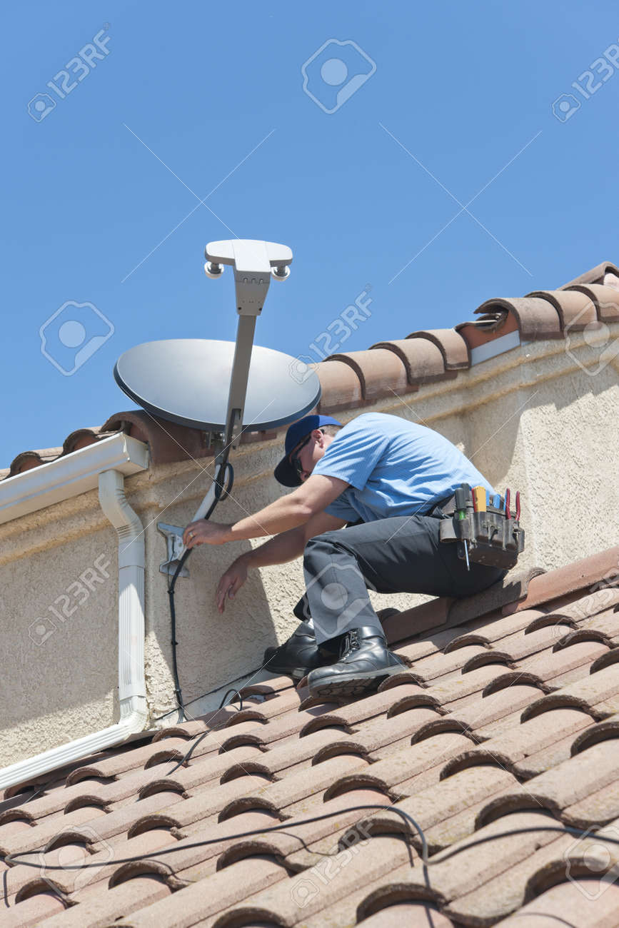 satellite installer on roof stock photo picture and royalty free satalite installer