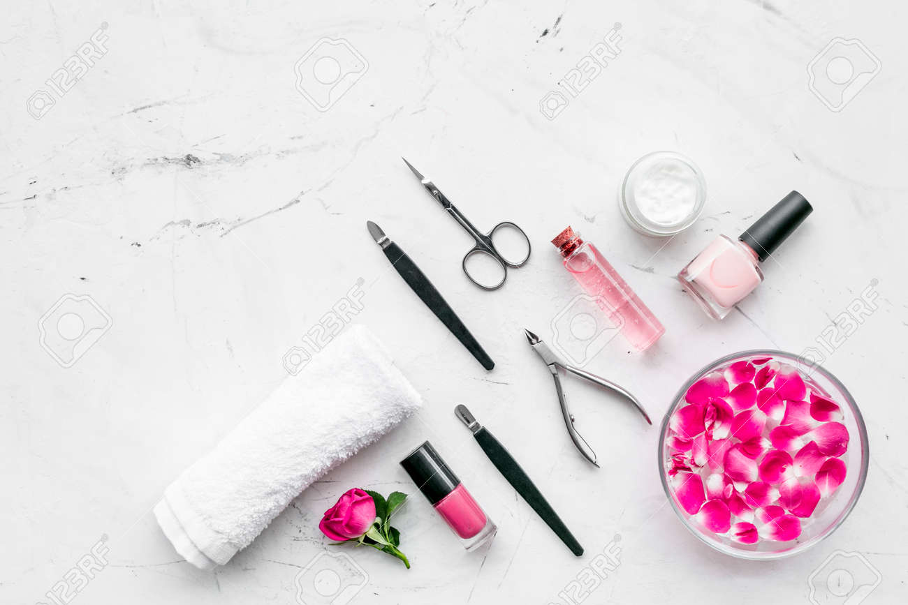 Download Manicure And Pedicure Equipment For Nail Bar Set On White Stone Background Top View Mockup Stock Photo Picture And Royalty Free Image Image 112902283