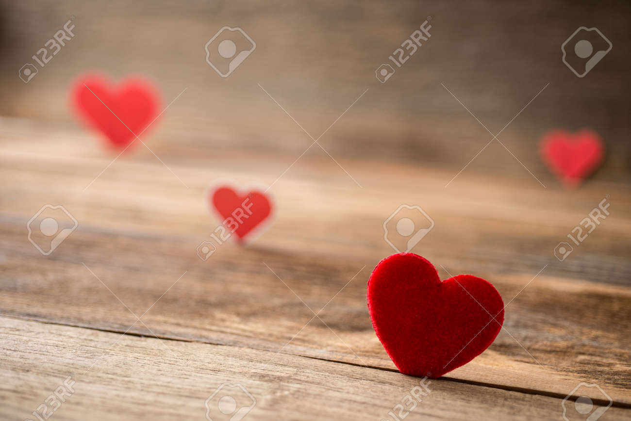 Red Valentine Hearts On Old Rustic Wooden Background Valentines Day Banque Dimages Red Valentine Hearts On Old Rustic Wooden Background Valentines Day Banque Dimages