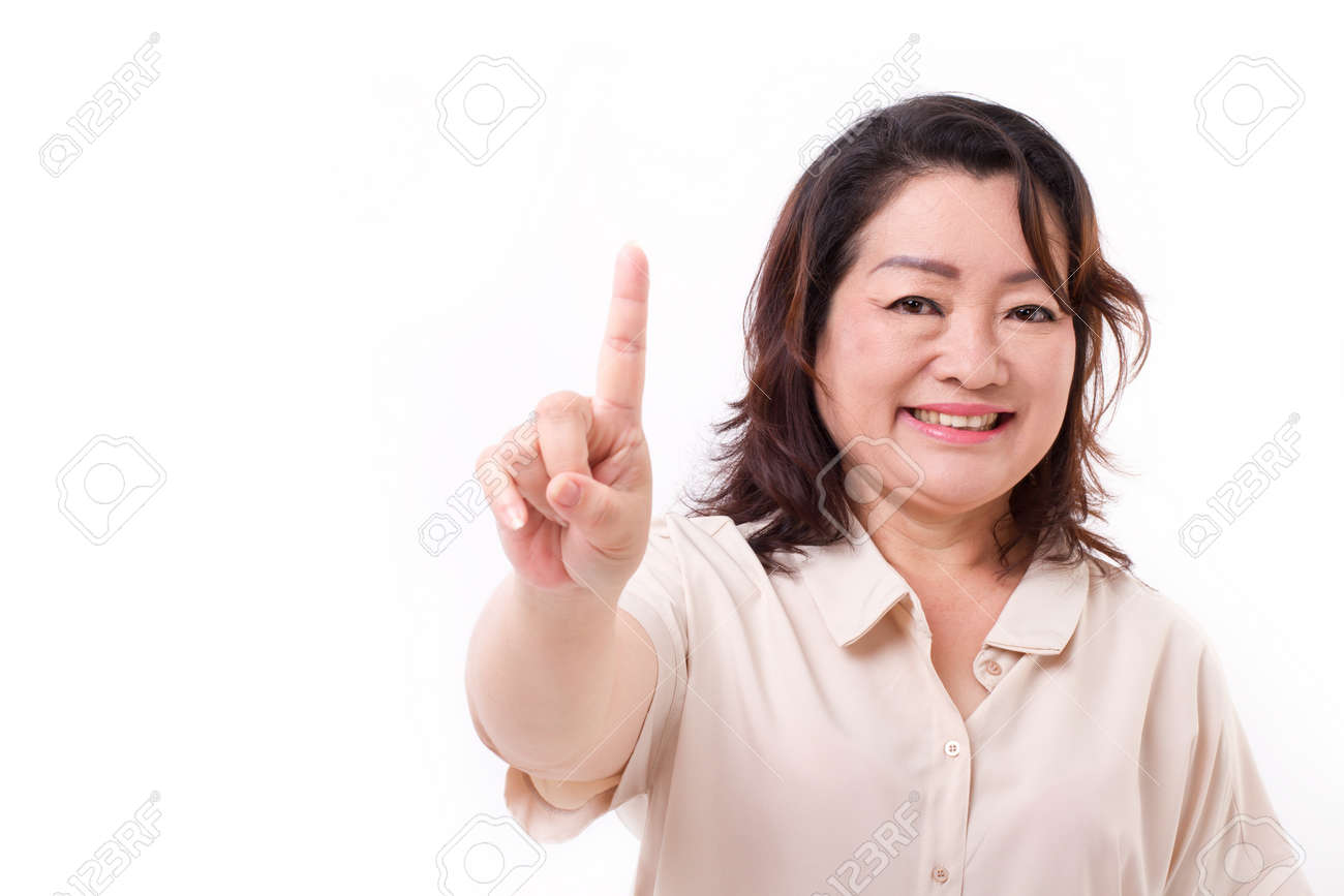 自信を持って 幸せな中年の女性数 1 手話ジェスチャー 1 本の指を指しています の写真素材 画像素材 Image 自信を持って 幸せな中年の女性数 1 手話ジェスチャー 1 本の指を指しています の写真素材 画像素材 Image