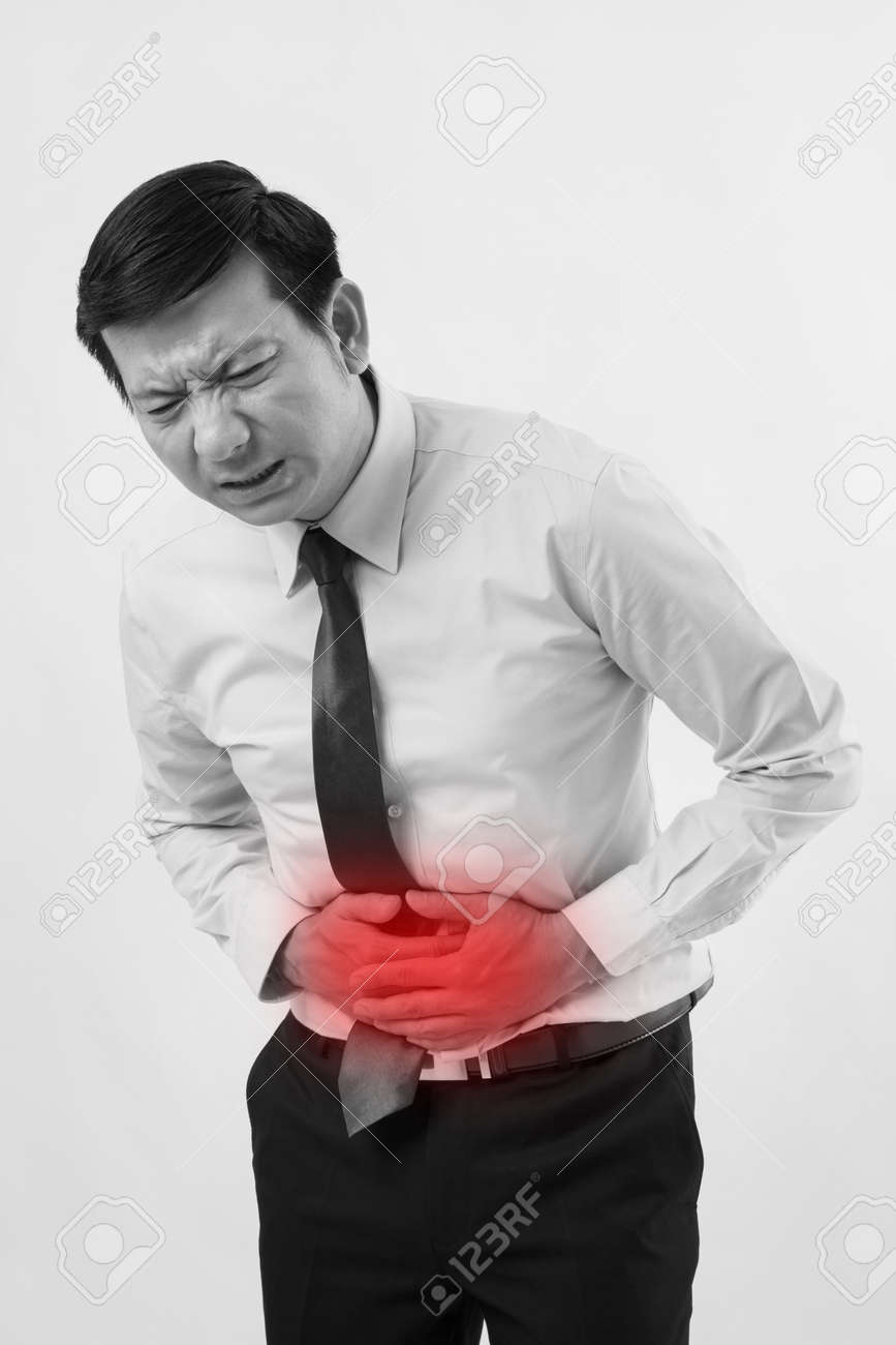 胃痛 消化不良 胃炎 下痢 消化不良 便秘症状を持つ病気のビジネスマン の写真素材 画像素材 Image