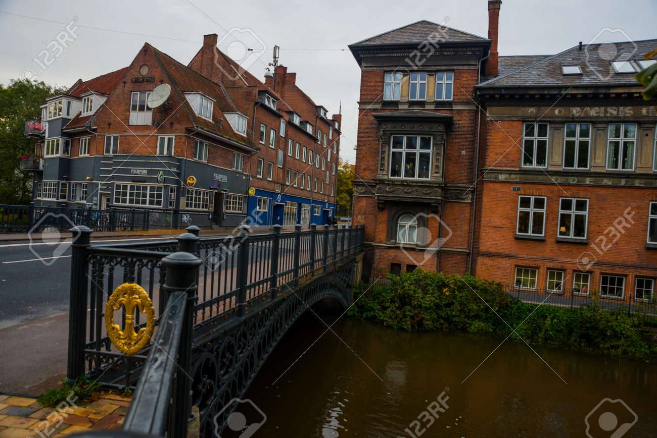 Beautiful Old Buildings On The Banks Of The River And The Bridge Stock Photo Picture And Royalty Free Image Image