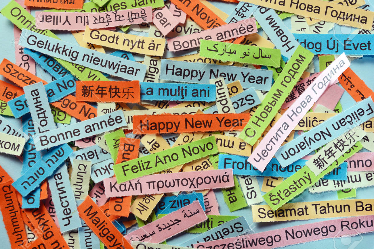 Feliz Año Nuevo Nube De La Palabra Impresa En Papel De Colores Diferentes Idiomas