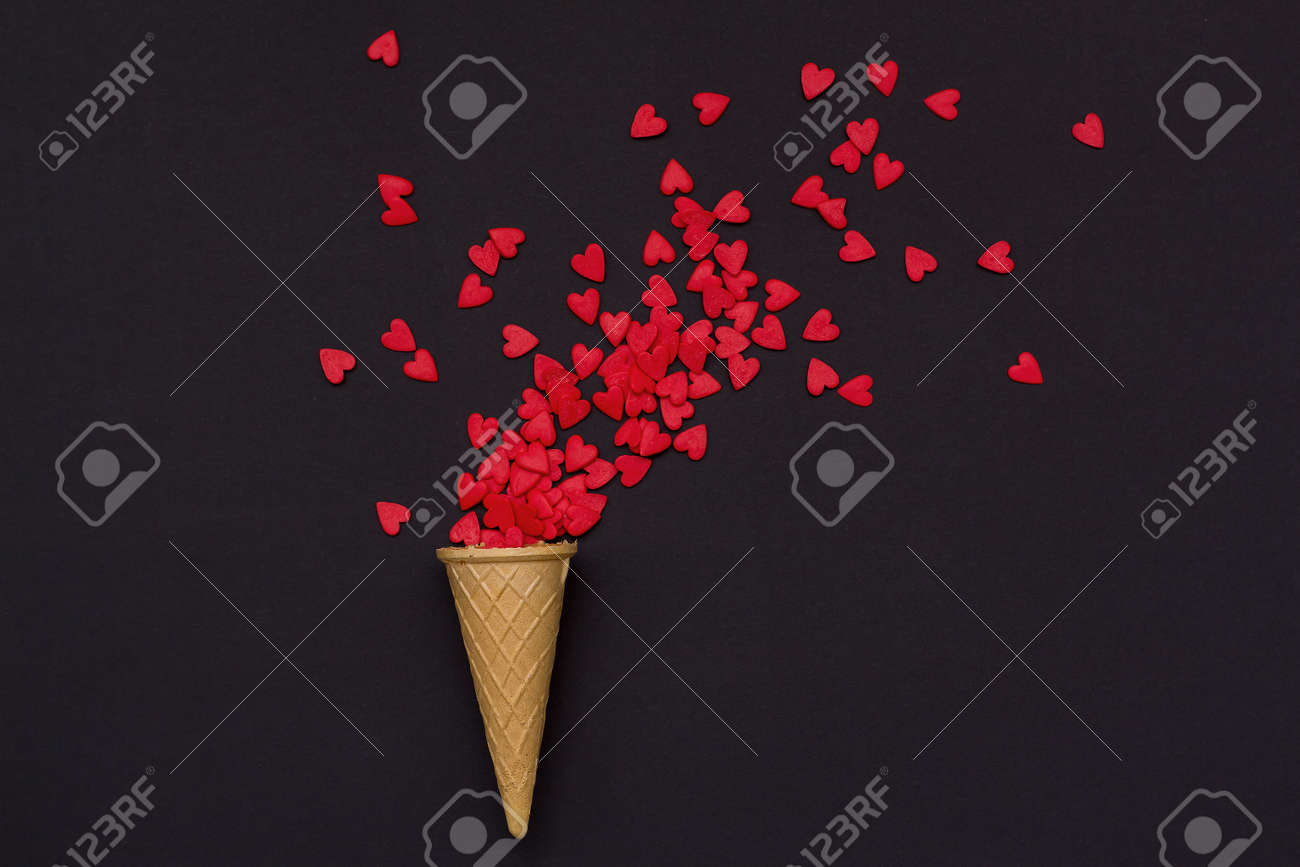 Waffle Cone And A Lot Of Small Hearts On A Black Background Romantic Stock Photo Picture And Royalty Free Image Image 70767601