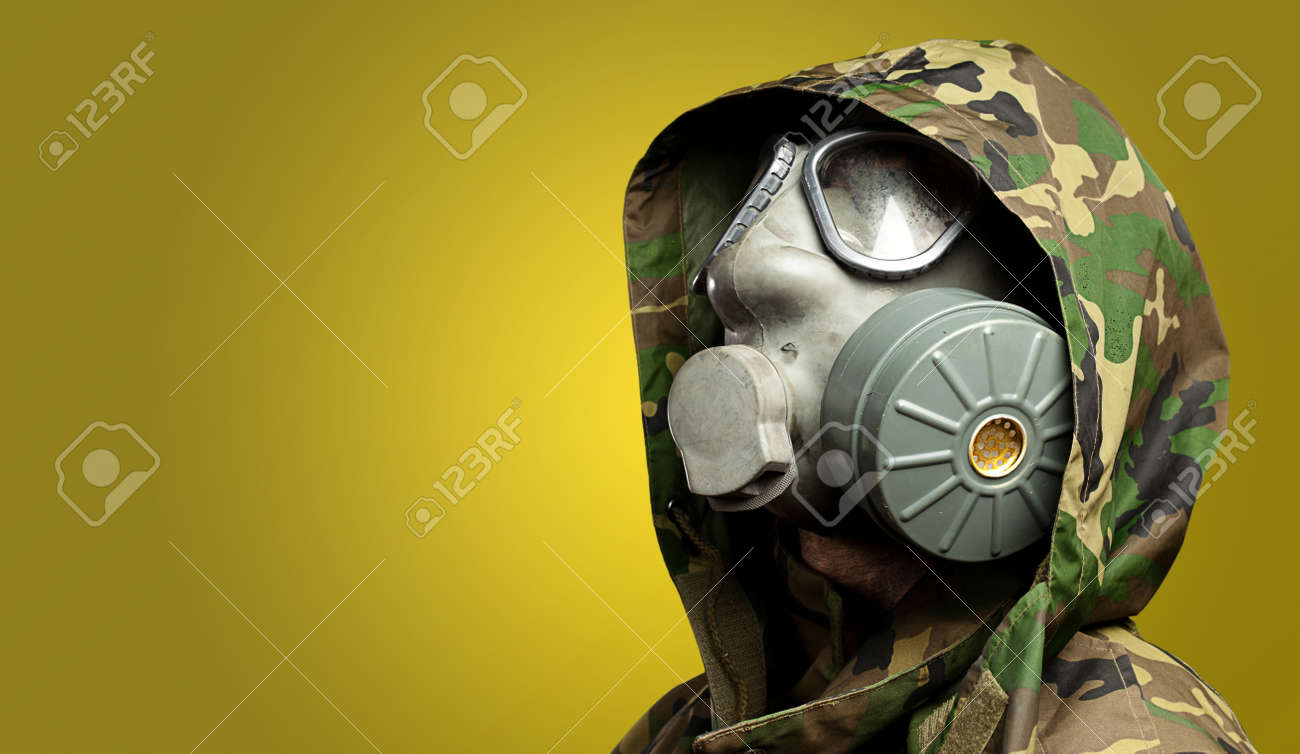 Download Closeup Of A Soldier Wearing A Gas Mask Against A Yellow Background Stock Photo Picture And Royalty Free Image Image 16672482 PSD Mockup Templates