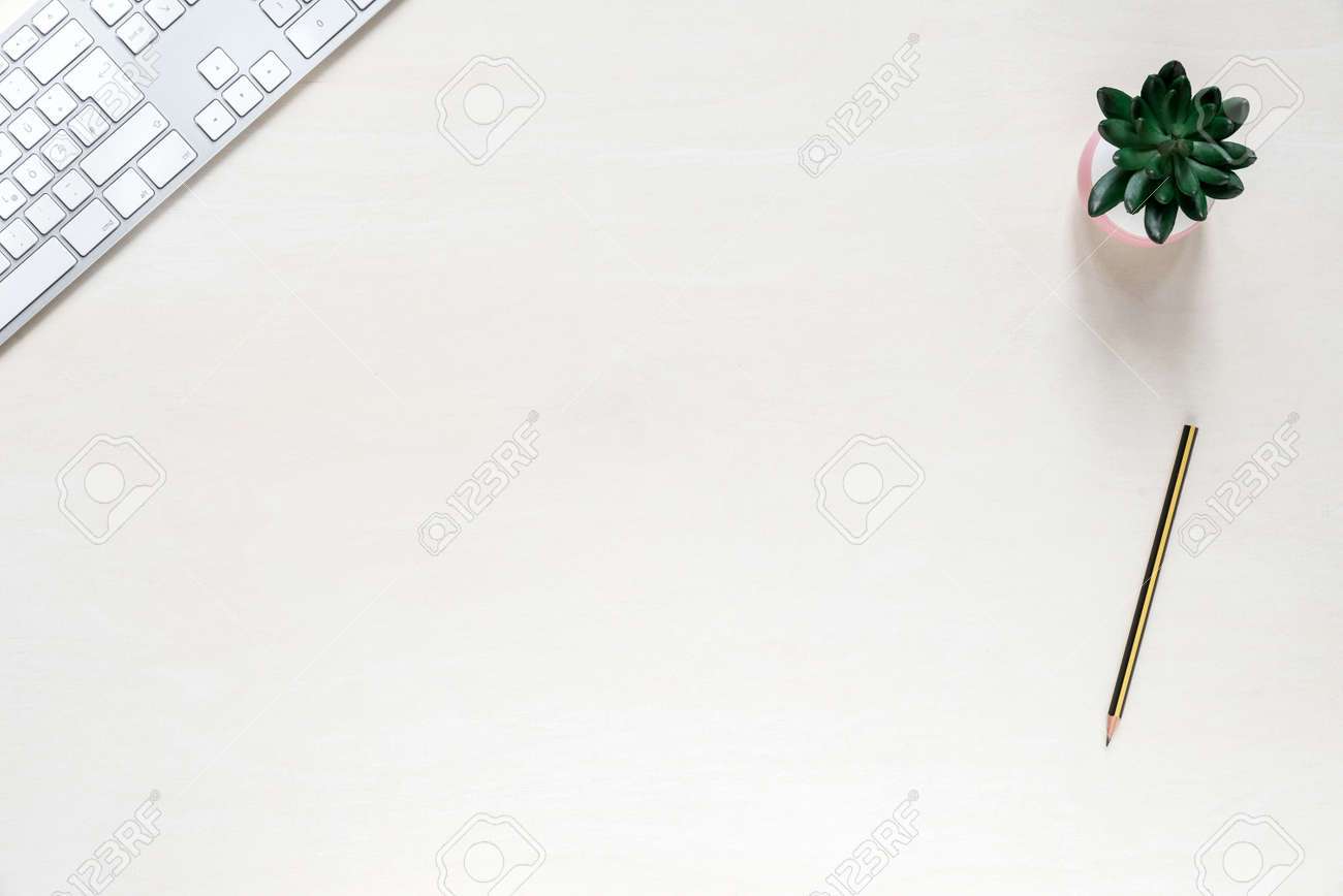 blank copy space on office desk background with keyboard pencil