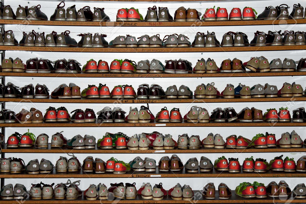 a rack full of different colors and size bowling shoes stock photo bowling shoes size