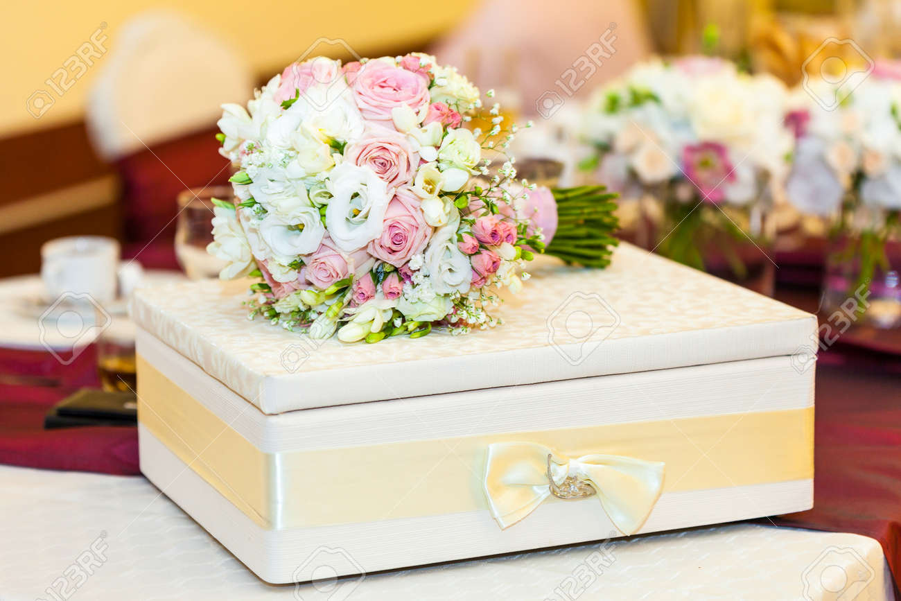 Wedding Table Decoration With Bride Bouquet With Gift Box Stock Photo Picture And Royalty Free Image Image 24232937