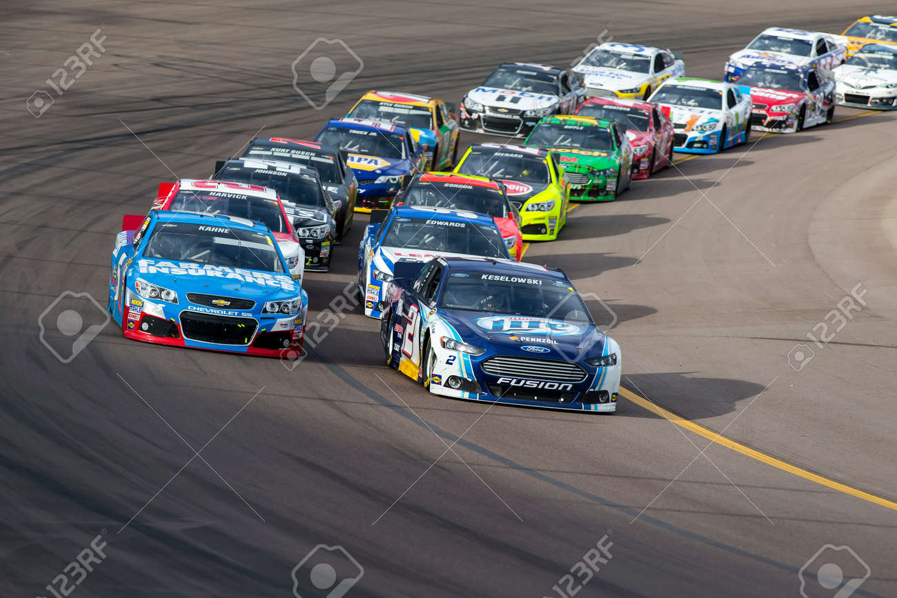 Avondale, AZ - Nov 10, 2013: The NASCAR Sprint Cup teams take to the track for the AdvoCare 500 race at the Phoenix International Raceway in Avondale, AZ. - 24047918 Avondale, AZ - Nov 10, 2013: The NASCAR Sprint Cup teams take to the track for the AdvoCare 500 race at the Phoenix International Raceway in Avondale, AZ. - 24047918