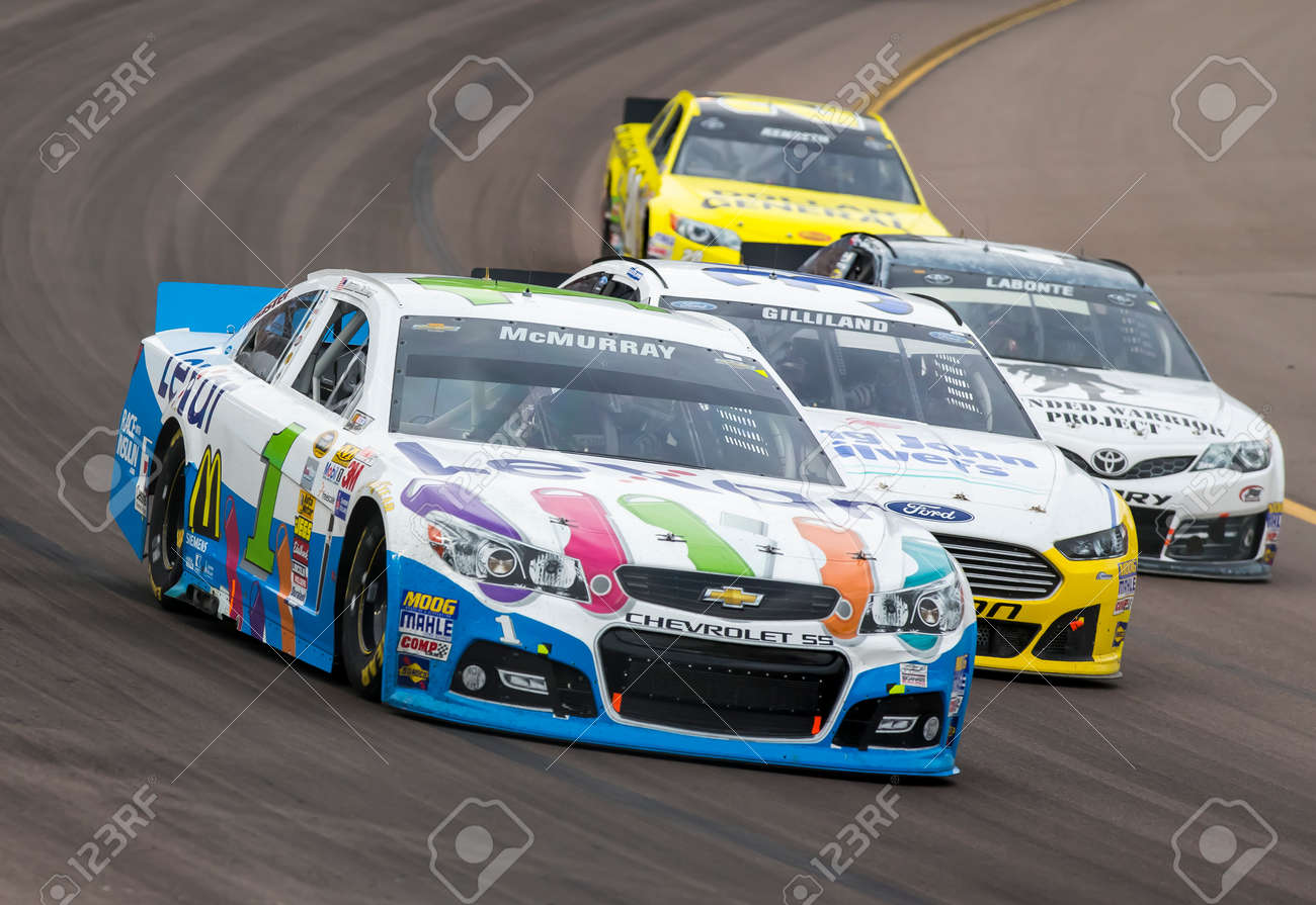 Avondale, AZ - Nov 10, 2013: Jamie McMurray (1) brings his race car through the turns during the AdvoCare 500 race at the Phoenix International Raceway in Avondale, AZ. - 24047920 Avondale, AZ - Nov 10, 2013: Jamie McMurray (1) brings his race car through the turns during the AdvoCare 500 race at the Phoenix International Raceway in Avondale, AZ. - 24047920