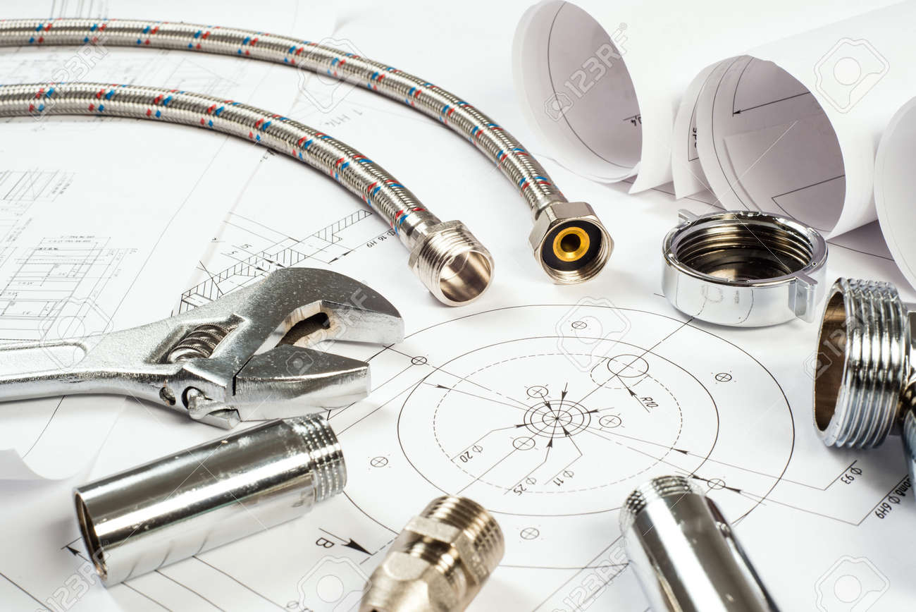 Plumbing And Drawings Are On The Desktop Workspace Engineer Stock Photo Plumbing And Drawings Are On The Desktop Workspace Engineer Stock Photo