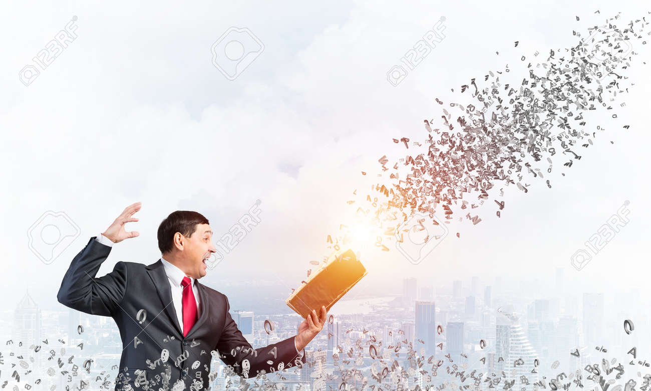 Featured image of post Man Holding A Book Reference