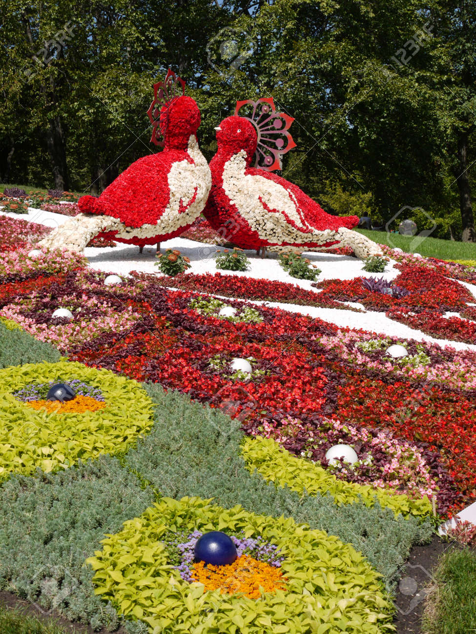 Two Large Birds Made Of Flowers In The Park In The Middle Of Stock Photo Picture And Royalty Free Image Image 103973435