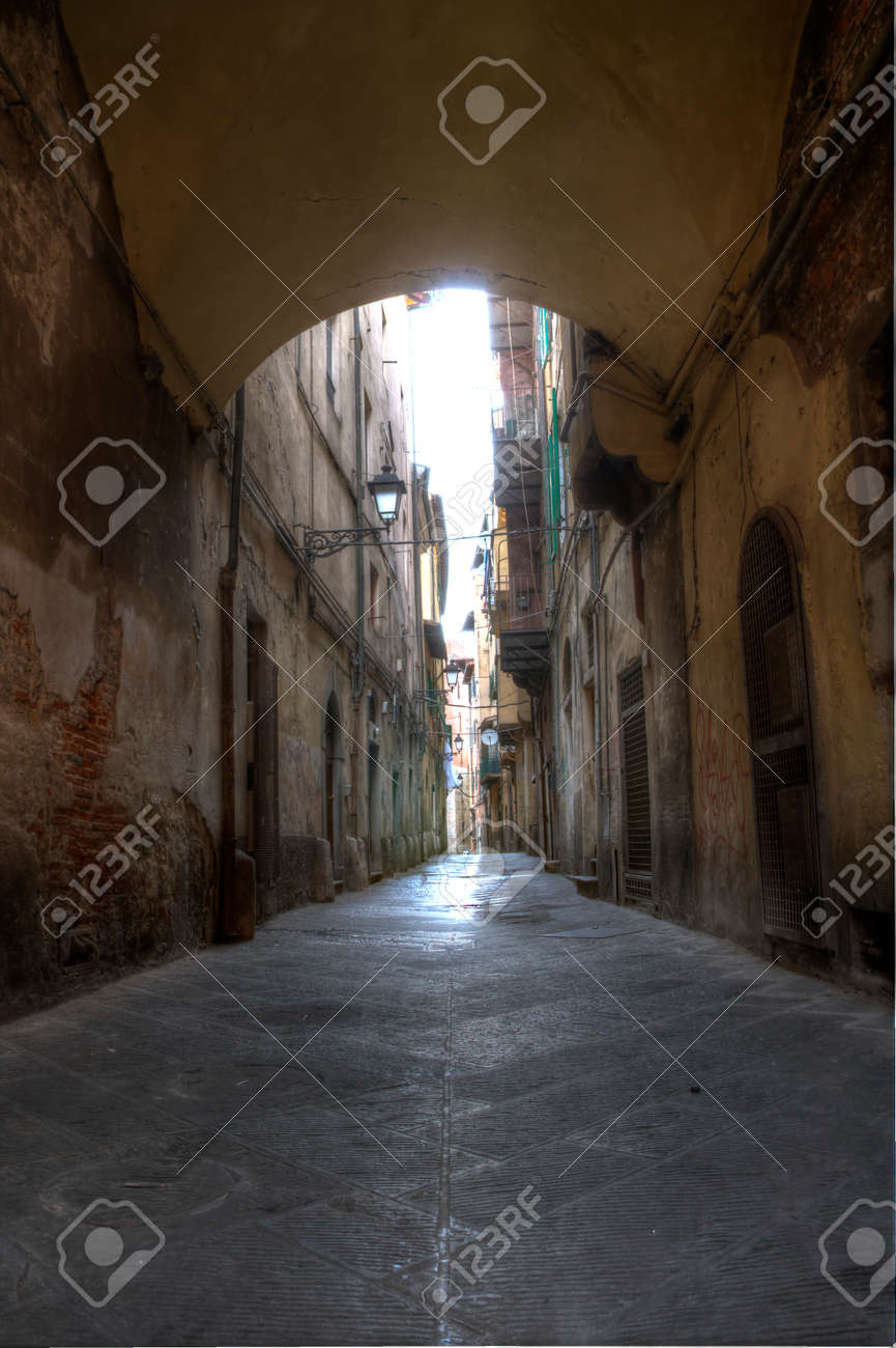 Narrow Alley With Old Buildings In Medieval Town of Pisa, Tuscany, Italy - 29620812 Narrow Alley With Old Buildings In Medieval Town of Pisa, Tuscany, Italy - 29620812