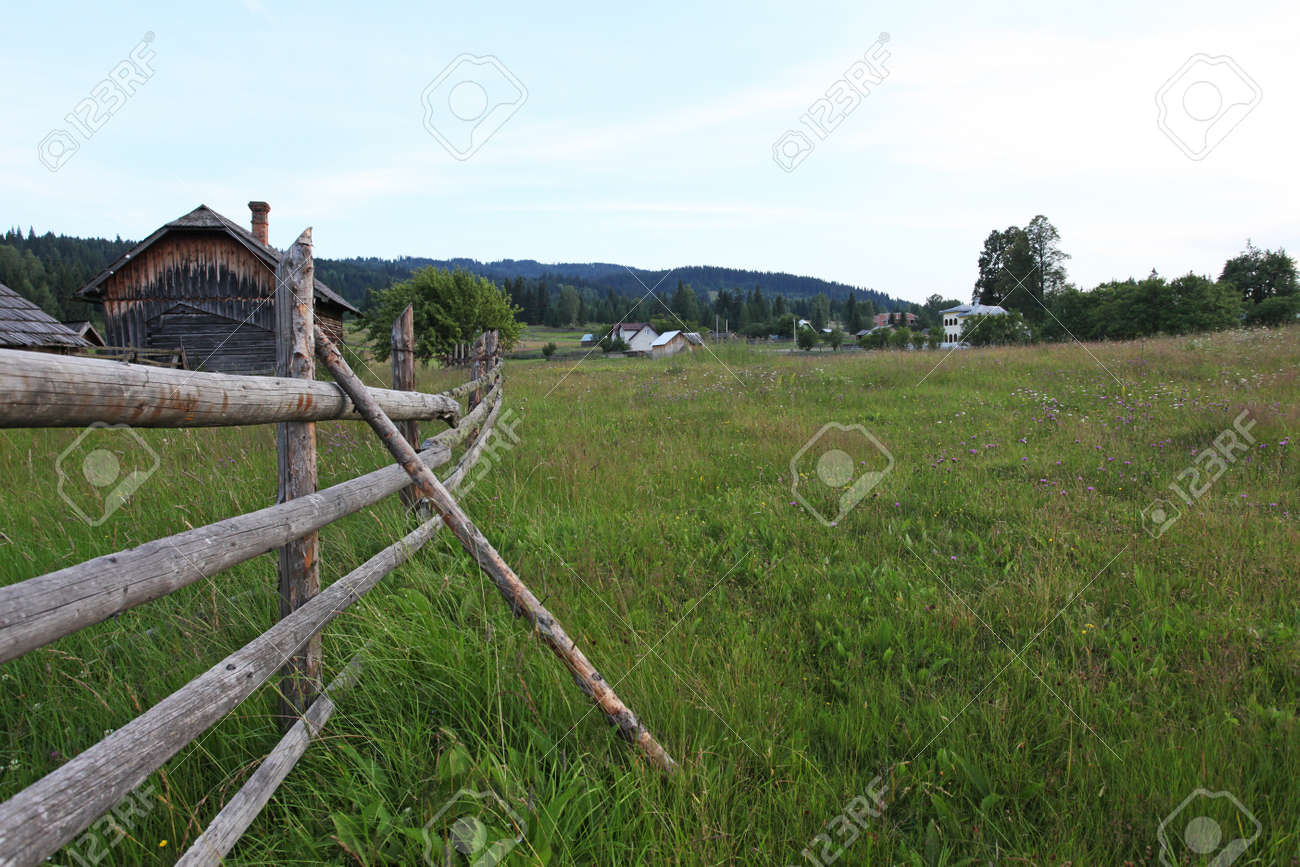 countryside fence landscape in bucovina romania stock photo