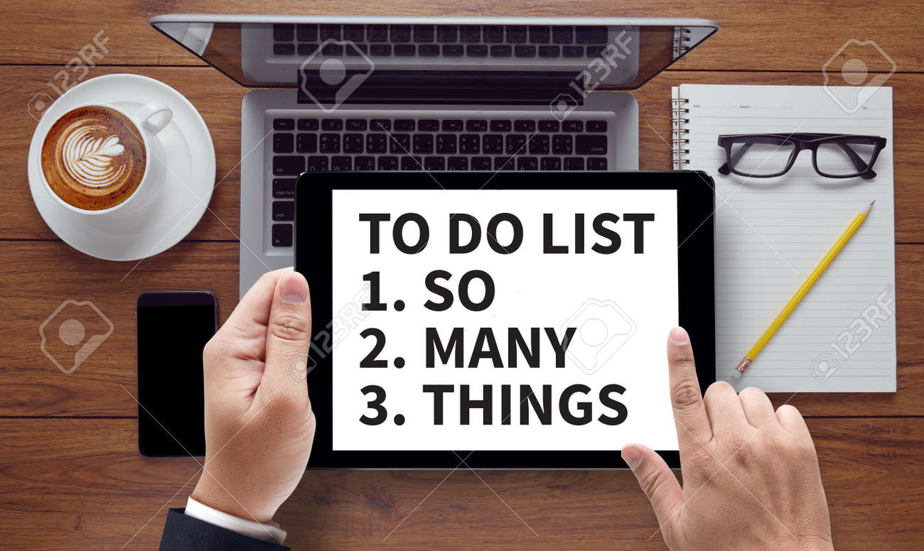 to do list so many things on the tablet pc screen held by