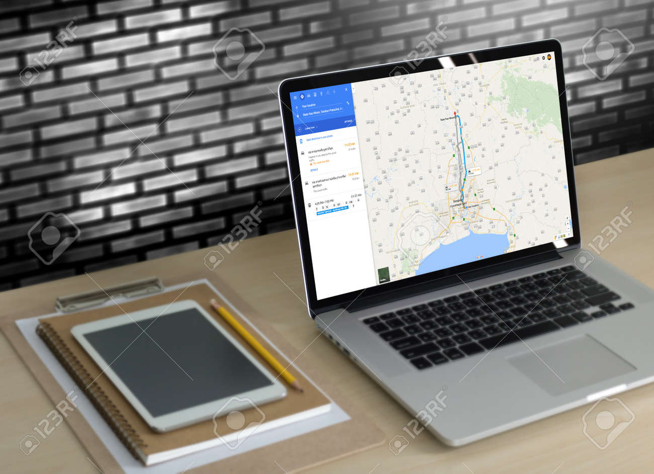 BANGKOK, THAILAND -1 JUNE 2016: Close up of man use and computer iphone smartphone and using application Google Maps to destination. navigation service by Google map - 80306969 BANGKOK, THAILAND -1 JUNE 2016: Close up of man use and computer iphone smartphone and using application Google Maps to destination. navigation service by Google map - 80306969