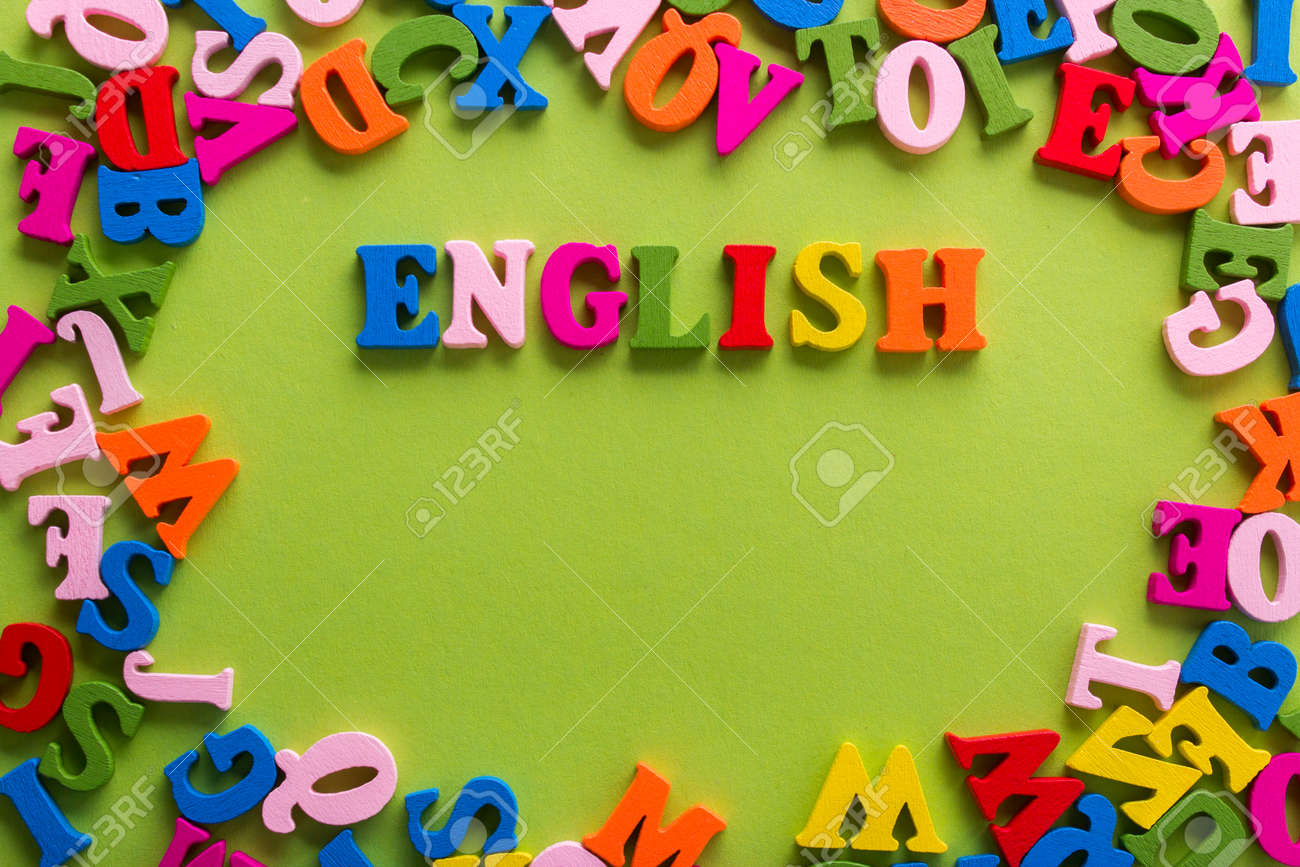 Word of English of color wooden letters of the alphabet on a blue background - 70759948 Word of English of color wooden letters of the alphabet on a blue background - 70759948