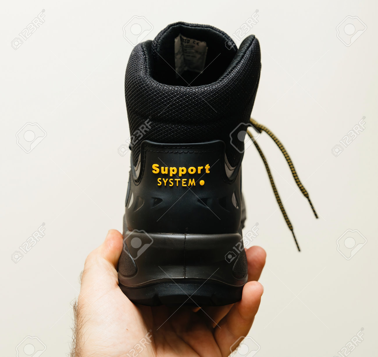 Hand Holding New Safety Shoes S3 HRO WR SRC Hydro Modytex High