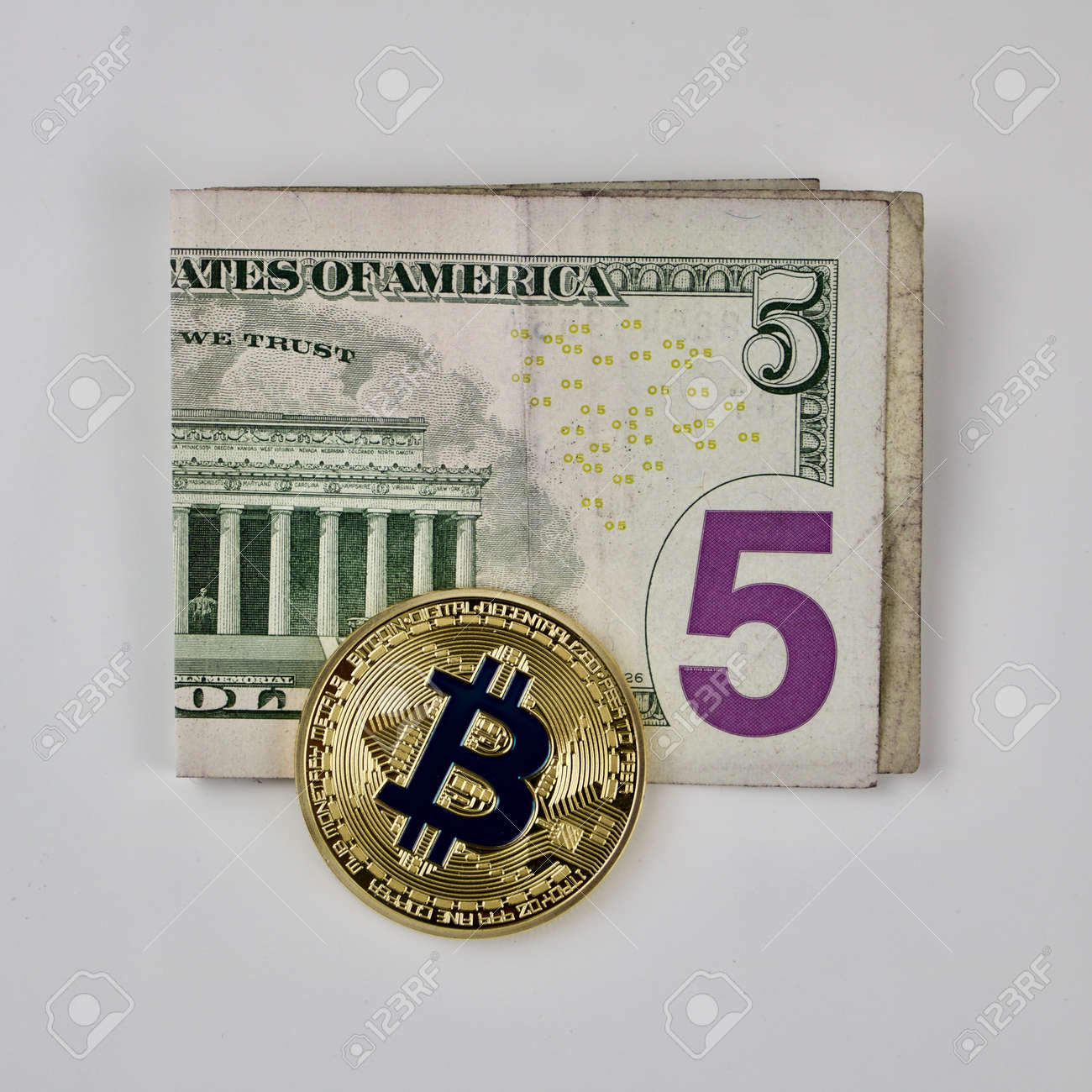 Cryptocurrency Physical Gold Bitcoin Coin On The Five Dollars. Stock Photo,  Picture and Royalty Free Image. Image 78938658.