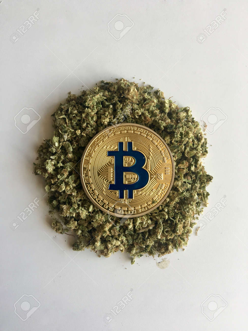 Digital Currency Physical Gold Bitcoin Coin On Dry Weed Stock Photo,  Picture and Royalty Free Image. Image 80218841.