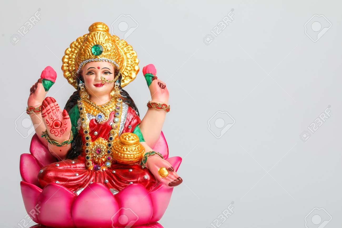 Beautiful Clay Idol Of Hindu Goddess Lakshmi OR Laxmi On White Background  Stock Photo, Picture and Royalty Free Image. Image 162448719., image size:1300x867