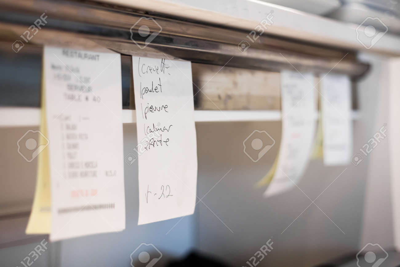 Restaurant Kitchen Photography orders in a portuguese restaurant kitchen stock photo, picture and Restaurant Kitchen Photography orders in a portuguese restaurant kitchen stock photo, picture and
