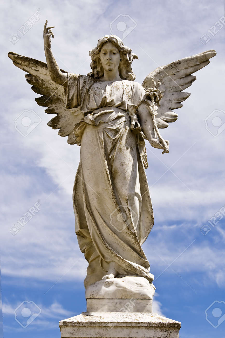 angel statue on a pedestal stock photo picture and royalty free