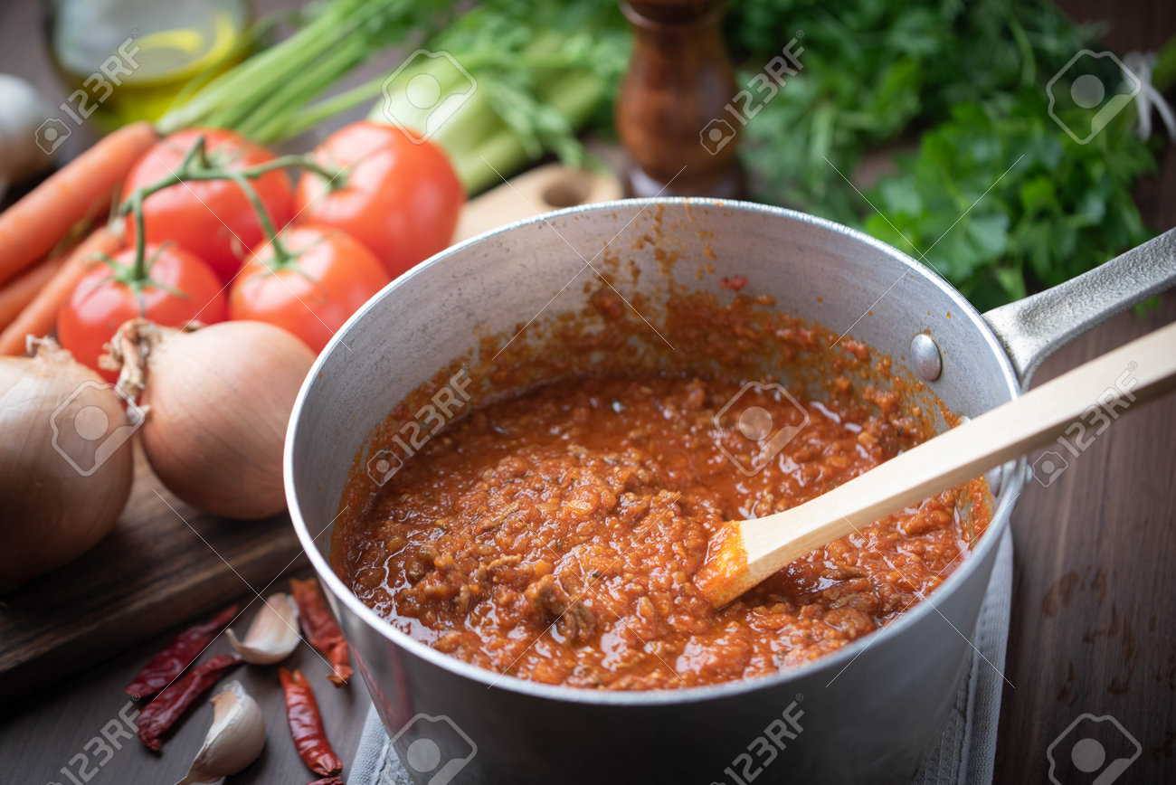Bolognaise Sauce In Pot With Ingredients Background Stock Photo Picture And Royalty Free Image Image 139068659