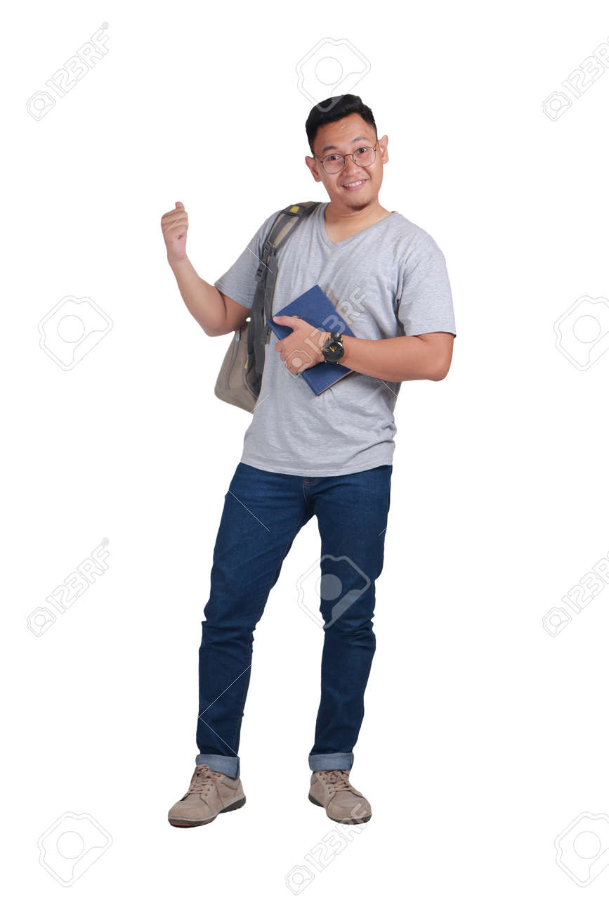 白い上に孤立したアジアの若い男子学生の肖像画 笑顔の幸せなジェスチャー 後ろを指差す の写真素材 画像素材 Image 9430